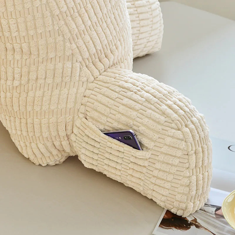 Coussin de lecture lavable contre la tête de lit