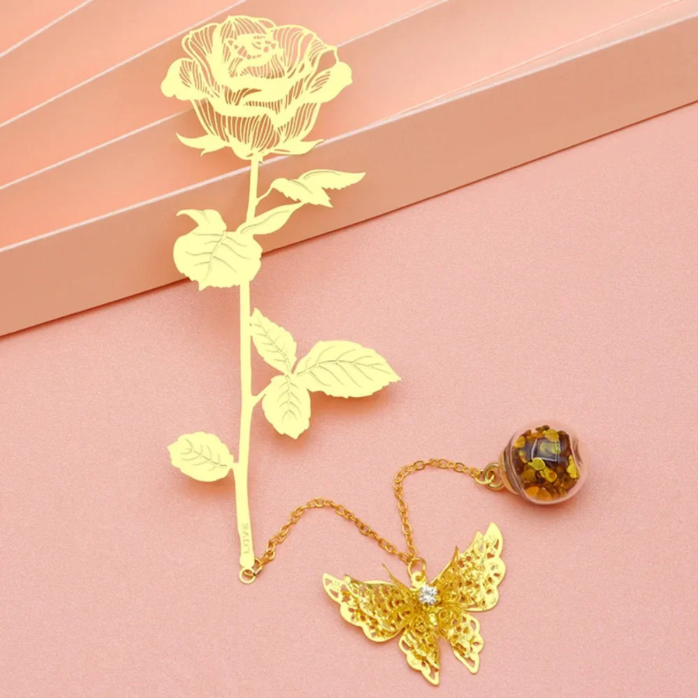 marque page doré pour femme en forme de rose doré