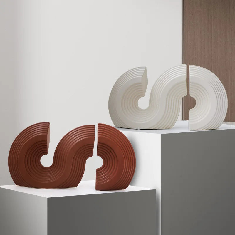 Design pour caler les livres avec serre livre en forme de S